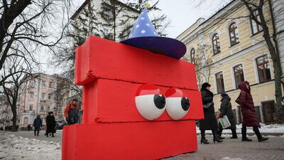 Сoncrete blocks previously used for barricades are turned into Christmas decorations in central Kyiv, Ukraine. Reuters