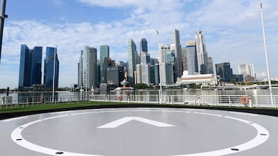 The VoloPort prototype launch pad is seen at Marina Bay against the city skyline where the Volocopter unmanned air taxi transport test flight will take place during the 26th Intelligent Transport Systems World Congress (ITSWC) in Singapore. AFP