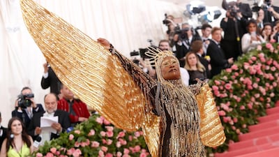 Once arrived, Billy Porter wore a gold sequined cat suit with golden feathered 'wings.' Reuters