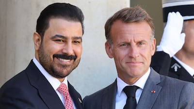 Iraqi Prime Minister Ali Al Zaidi, left, meets French President Emmanuel Macron in Paris. AFP