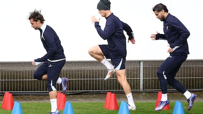 France's Antoine Griezmann, left, trains with Benjamin Pavard and Theo Hernandez. AFP