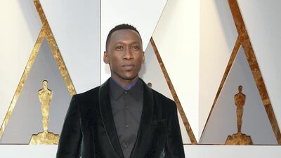 Mahershala Ali, in Berluti, arrives for the 90th Annual Academy Awards on March 4, 2018, in Hollywood, California. AFP