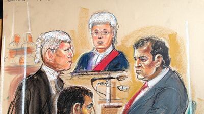 October 16, 2014 - The defending barrister questions Efremi while Spence looks on Credit: Priscilla Coleman / MB Media, for The National