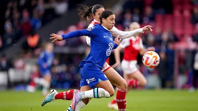 Chelsea's Sam Kerr and Arsenal's Rafaelle Souza battle for the ball. PA