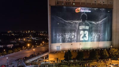 Fans react in downtown Cleveland after the Cleveland Cavaliers won the NBA Championship on at Cleveland, Ohio, on Sunday. Jason Miller / Getty Images / AFP