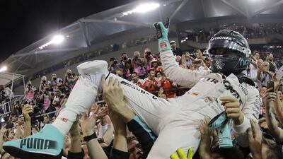 Nico Rosberg celebrates after winning the Formula One drivers' championship. Valdrin Xhemaj / EPA