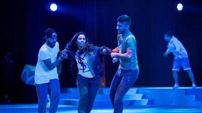 Shomoos, centre, played by Emirati soprano Balqees Fathi, during rehearsals. Victor Besa for The National