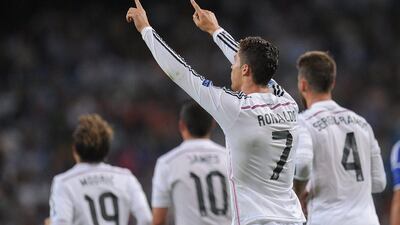 Cristiano Ronaldo of Real Madrid celebrates after scoring Real's third goal during their Champions League victory over FC Basel on Tuesday night. Denis Doyle / Getty Images / September 16, 2014