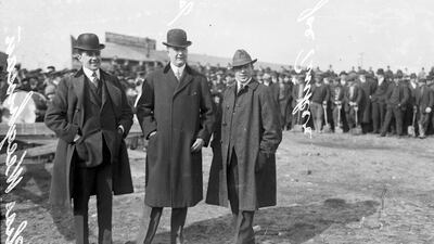 This 1914 photo provided by the Chicago History Museum shows, from left to right, Charles Weeghman, James Gilmore, and Federal League baseball player Joe Tinker (wearing street clothes), attending the groundbreaking of Weeghman Park in Chicago. Weeghman Park was renamed Wrigley Field in 1927. The famed ballpark will celebrate its 100th anniversary on April 23, 2014. AP / Chicago History Museum