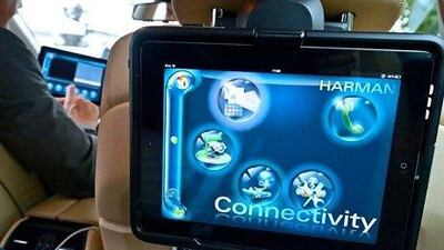 Harman showcased its vehicle connectivity technology, which operates and activates devices aboard a car via a built-in WLan, in Berlin last month. Rainer Jensen / EPA