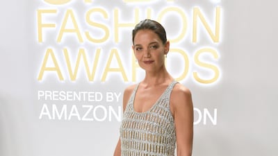Actress Katie Holmes arrives in a crystal mesh dress by Jonathan Simkhai.