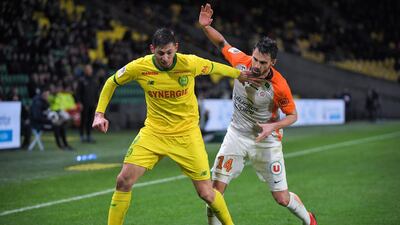 Monpellier's French defender Damien Le Tallec (R) vies with Nantes' Argentinian forward Emiliano Sala during the French L1 match between Nantes and Montpellier at the La Beaujoire stadium in Nantes on January 8, 2019. AFP