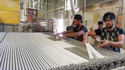 Chalk rods before they are cut to size.