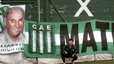 Argentina fan Matias Antelo with a banner paying tribute to his late father, Gustavo. Photo: Matias Antelo