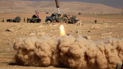 Members of the Iraqi rapid response forces fire a missile toward ISIL militants during a battle in the south of Mosul, Iraq February 19, 2017. REUTERS/Zohra Bensemra