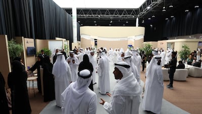 Visitors attend the Al Ain Future Business Forum at Adnec in Al Ain. Chris Whiteoak / The National