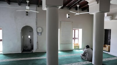 Al Aqroubi Mosque in Al Khan, Sharjah, was built in 1904 and can hold 100 people for worship. Pawan Singh / The National