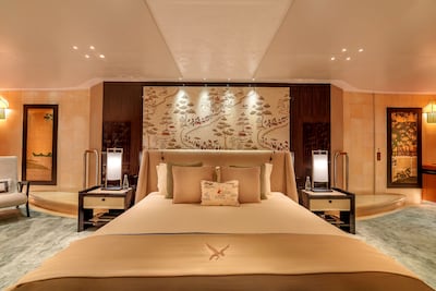 The master suite includes a private deck with a day bed angled towards the coastline. Photo: Jumeirah
