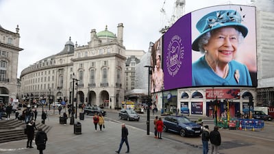 A portrait of Queen Elizabeth II is displayed on the large screen at Piccadilly Circus, London, to mark the start of her platinum jubilee on February 6. Getty