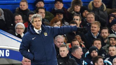 Manchester City manager Manuel Pellegrini directs his team during their 1-1 Premier League draw with Chelsea on Saturday. Andy Rain / EPA / January 31, 2015