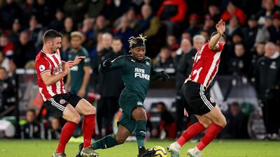 Newcastle's Allan Saint-Maximin runs at the Sheffield United defence. Getty
