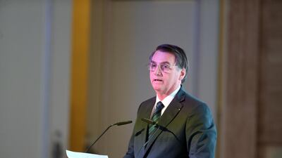 Brazilian President Jair Bolsonaro speaks at the UAE-Brazil Business Forum in Abu Dhabi. Reuters