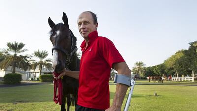 South African trainer Ernst Oertel has eight screws in his leg after shattering his tibia and fibula after falling from a horse. Mona Al Marzooqi / The National