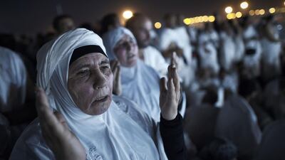 Muslims perform the Haj ritual on Mount Arafat near Mecca early on September 23, 2015. All photos by Mohammed Al Shaik / AFP Photo