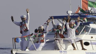 Young Emiratis participate in a boat parade in Fujairah marking the 42nd UAE National Day. Jaime Puebla / The National