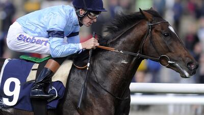 Richard Hughes will be a busy man as he is scheduled to ride six horses in Friday's meeting at Jebel Ali Racecourse. Alan Crowhurst / Getty Images
