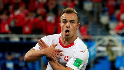 Switzerland's Xherdan Shaqiri celebrates scoring their second goal against Serbia in the World Cup. Reuters