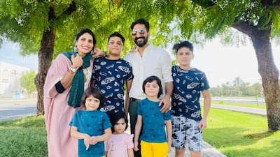 Ms Noushi with her family