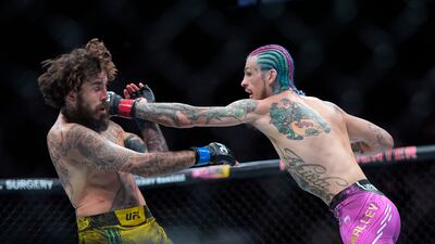 Sean O'Malley hits Marlon Vera. AP