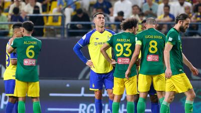 Nassr's Portuguese forward Cristiano Ronaldo (C) looks on during the Saudi Pro League football match between Al-Nassr and Al-Khaleej at the al-Awwal Park Stadium in the Saudi capital Riyadh on May 8, 2023. (Photo by Fayez NURELDINE / AFP)