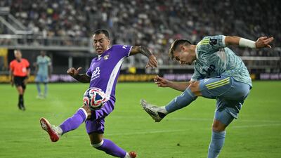 Al Ain's Alejandro Romero tries to block Juventus forward Francisco Conceicao. AFP