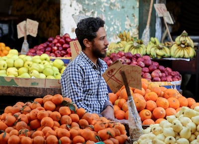 A fruit seller at a market in Cairo. The economy remains the central issue for most Egyptians. Reuters