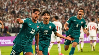 Iraqi's Mohanad Ali, left, after against the UAE in their World Cup qualifier in Basra. AP