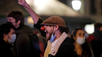 A man gestures and shouts during a fourth night of protests in support of Catalan rapper Pablo Hasel. Reuters
