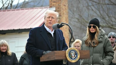 US President Donald Trump visiting a neighbourhood affected by Hurricane Helene in Swannanoa, North Carolina. AFP