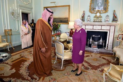 Britain's Queen Elizabeth II greets the Crown Prince of Saudi Arabia Mohammed bin Salman, during a private audience at Buckingham Palace in London, on Wednesday, March 7, 2018. Dominic Lipinski / via AP