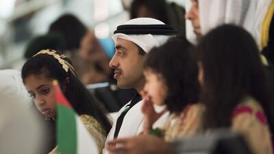 Sheikh Abdullah bin Zayed, Minister of Foreign Affairs (2nd L) and Sheikha Fatima bint Abdullah (L), attend the 44th UAE National Day celebrations held at Zayed Sports City. Mohamed Al Suwaidi / Crown Prince Court - Abu Dhabi