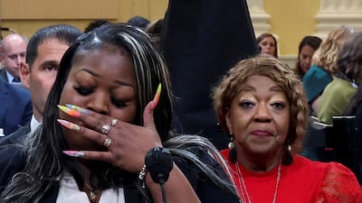 Wandrea "Shaye" Moss, a former Elections Department employee in Georgia, testifies before the US House committee investigating former president Donald Trump, as her mother, Georgia election worker Ruby Freeman, looks on. Reuters