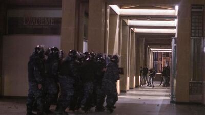 BEIRUT, LEBANON - JANUARY 22: Anti government protesters and riot police clash during a second day of violence, on January 22, 2020 in an upscale shopping district in Beirut, Lebanon. Weeks of bickering between the Hezbollah-allied political factions backing Lebanon's new Prime Minister Hassan Diab as to who gets which ministries has led protesters to decry his new government as partisan and political, and not the technocratic leadership they have been demanding since protests began on Oct 17th last year. (Photo by Sam Tarling/Getty Images)
