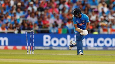 India's Bhuvneshwar Kumar loses his wicket. Reuters