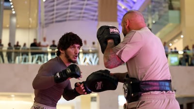 Movsar Evloev takes part in an open workout at Yas Mall.