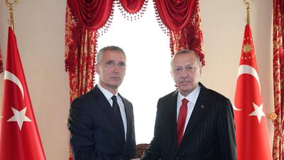 Turkish President Recep Tayyip Erdogan (R) shaking hands with NATO Secretary General Jens Stoltenberg (L) during their meeting in Istanbul, Turkey on October 11. EPA
