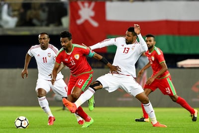 UAE player Khamis Esmaeel (R) in action against Oman player Ahmed Mubarak Al Mahaijri (L) during the Gulf Cup of Nations soccer final match between Oman and UAE at Jaber Al Ahmad International Stadium, Kuwait City, Kuwait, 05 January 2018. EPA/NOUFAL IBRAHIM