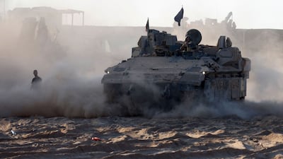 Israeli troops man a position near the border with the Gaza Strip. AFP