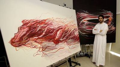 The artist Mattar bin Lahej in his studio, where he hosts budding artists for summer camps.