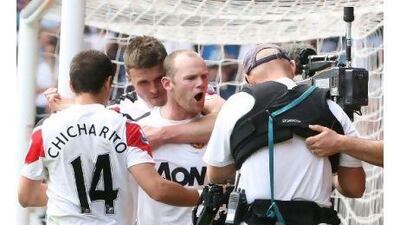 A reader advises Manchester United striker Wayne Rooney to accept his punishment of a two-match ban for using foul language in public during a match against West Ham United. Matthew Peters / Getty Images